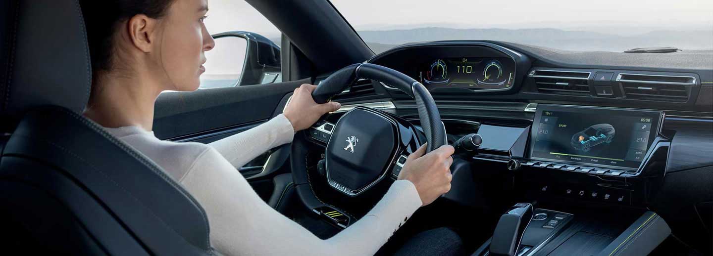 Interior view of a Peugeot hybrid vehicle