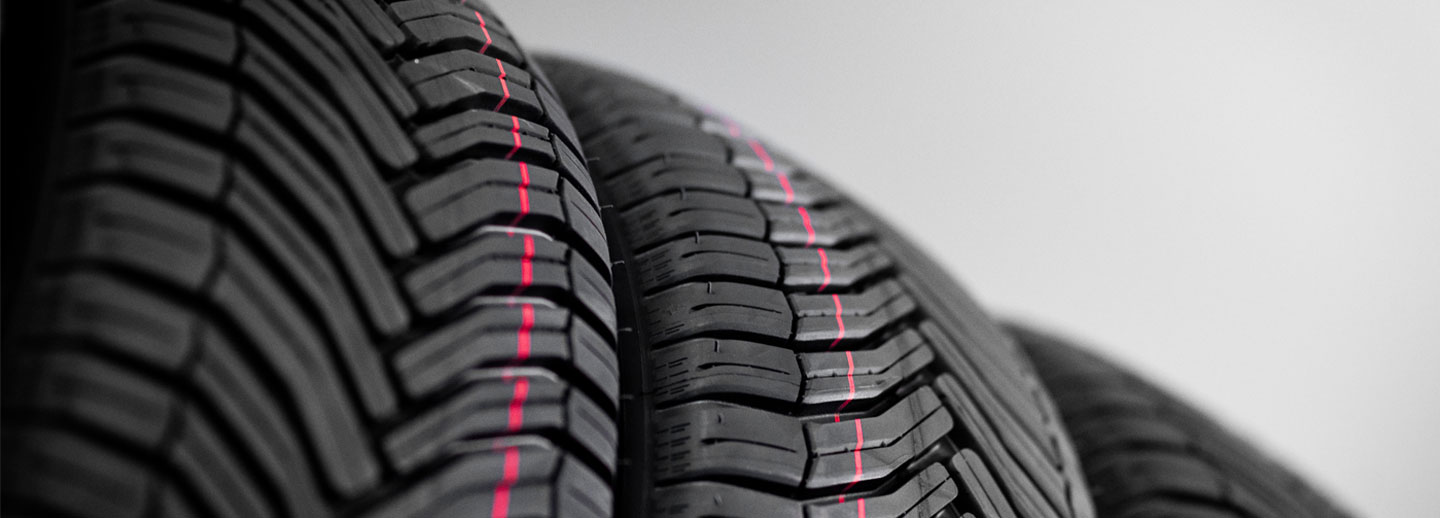 Multiple car tyres stacked