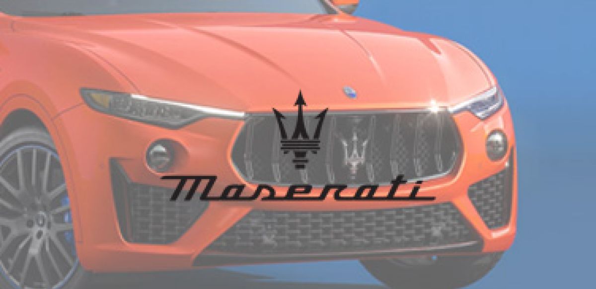 Greyscale Maserati logo with car in background