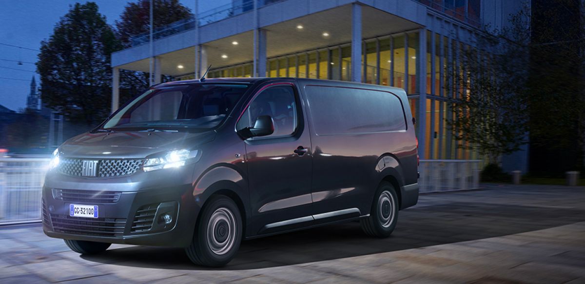 Scudo outside a building at night