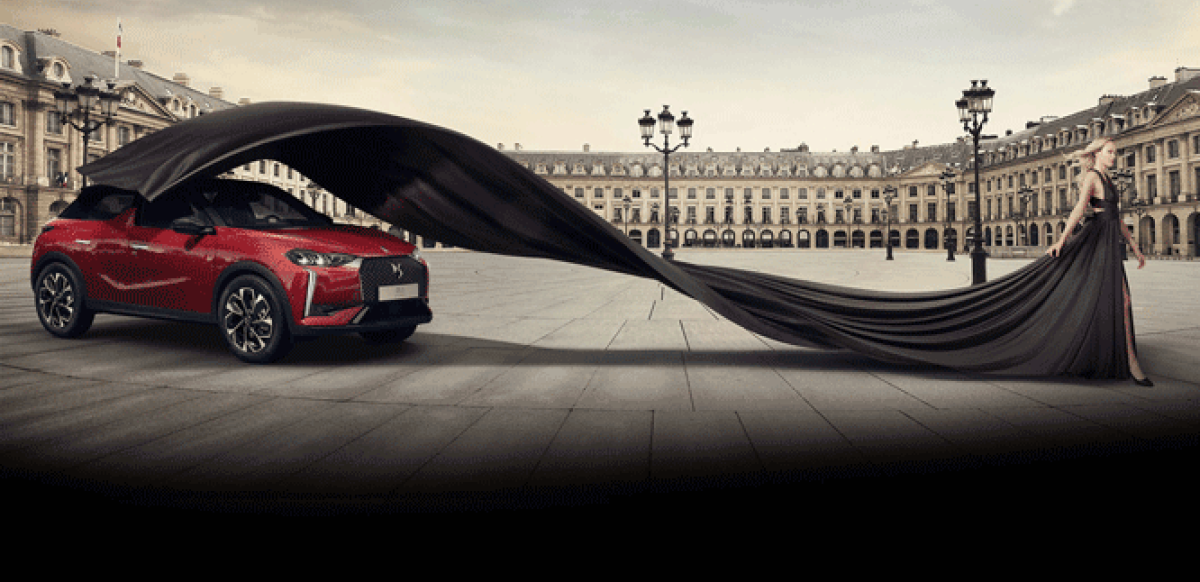 DS3 being uncovered by the train of a black dress