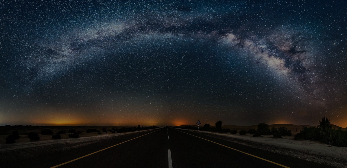 Starry road at night