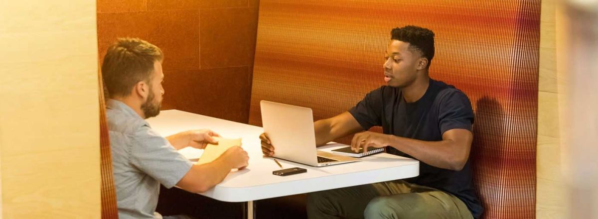 Two men having a meeting in an office