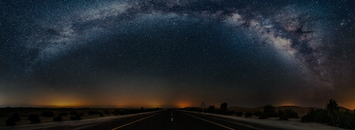 Starry road at night