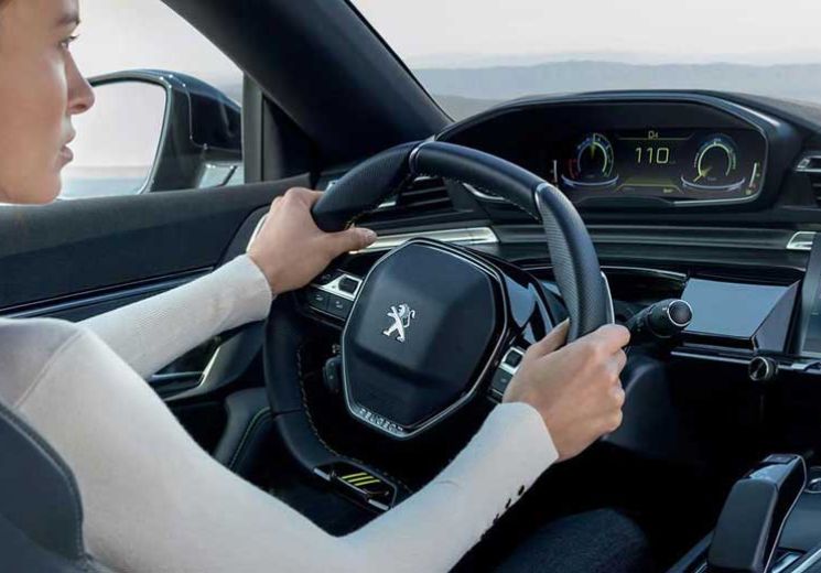 Interior view of a Peugeot hybrid vehicle
