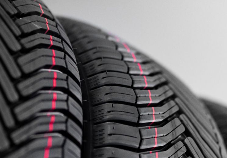 Multiple car tyres stacked