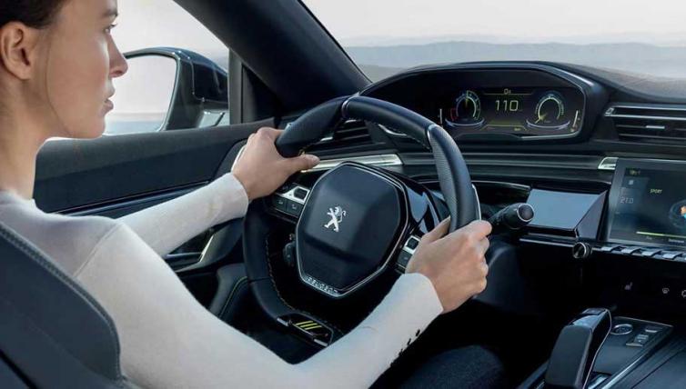 Interior view of a Peugeot hybrid vehicle