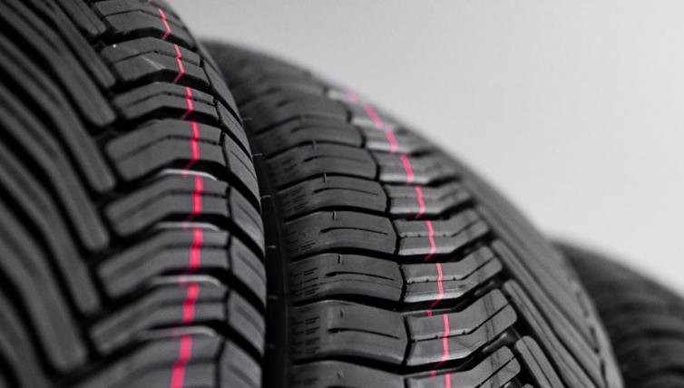 Multiple car tyres stacked
