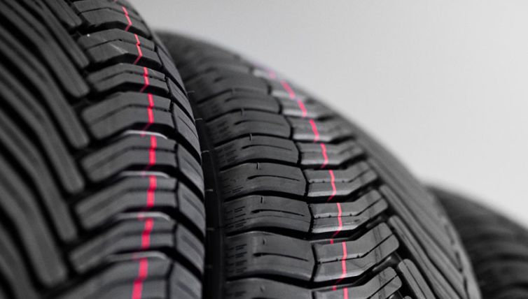 Multiple car tyres stacked