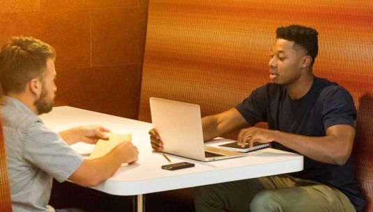Two men having a meeting in an office
