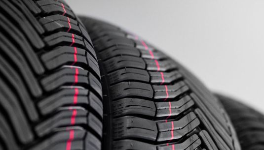 Multiple car tyres stacked