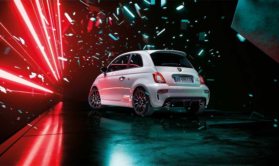 White Abarth 695 in a shattering surround